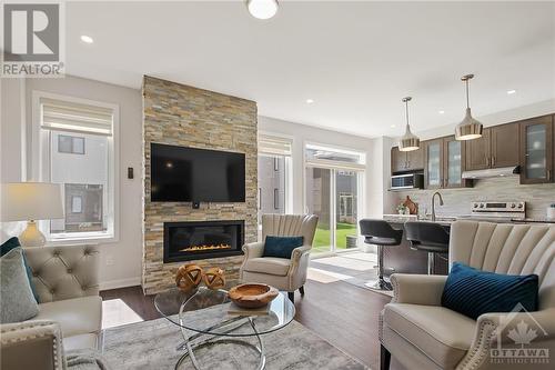 773 Derreen Avenue, Stittsville, ON - Indoor Photo Showing Living Room With Fireplace