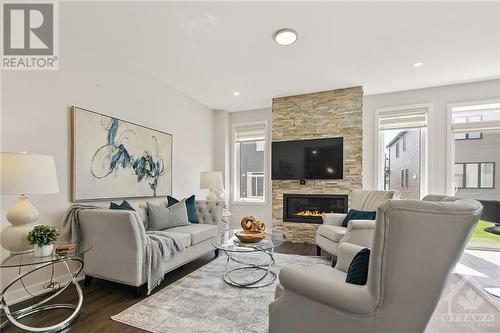 773 Derreen Avenue, Stittsville, ON - Indoor Photo Showing Living Room With Fireplace