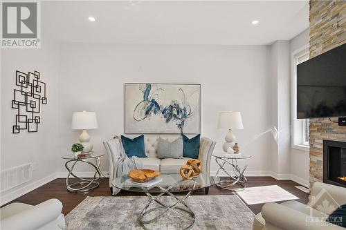 773 Derreen Avenue, Stittsville, ON - Indoor Photo Showing Living Room With Fireplace