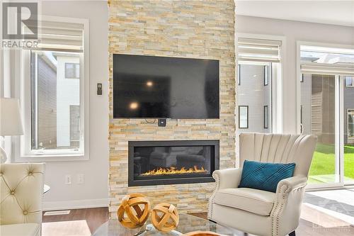 773 Derreen Avenue, Stittsville, ON - Indoor Photo Showing Living Room With Fireplace