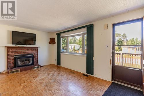 1034 Eighth Lane, Minden Hills, ON - Indoor Photo Showing Living Room With Fireplace