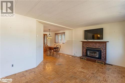 1034 Eighth Lane, Minden, ON - Indoor Photo Showing Living Room With Fireplace