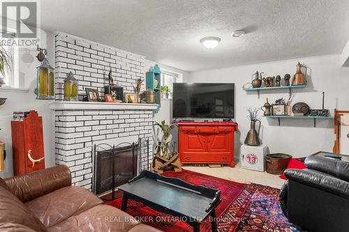 81 Clapperton Street, Barrie (Codrington), ON - Indoor Photo Showing Living Room With Fireplace