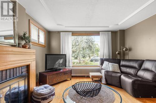 81 Clapperton Street, Barrie (Codrington), ON - Indoor Photo Showing Living Room With Fireplace