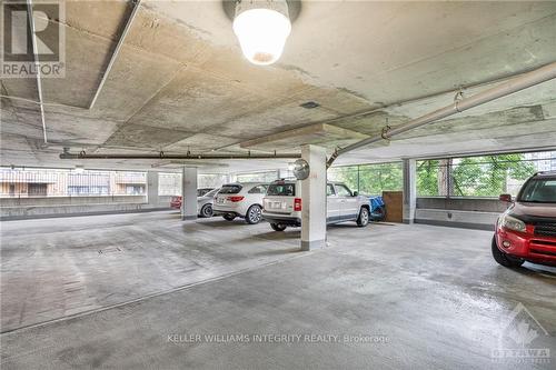 2304 - 530 Laurier Avenue W, Ottawa, ON - Indoor Photo Showing Garage