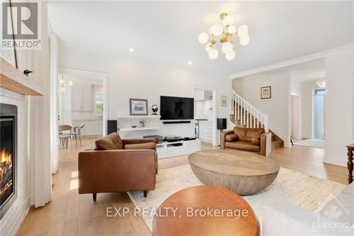 222 Pioneer Road, Russell, ON - Indoor Photo Showing Living Room With Fireplace