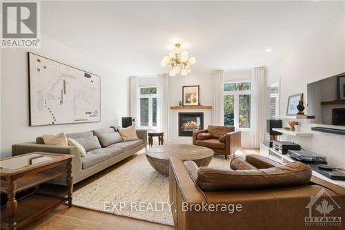 222 Pioneer Road, Russell, ON - Indoor Photo Showing Living Room With Fireplace