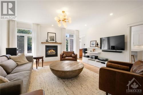 222 Pioneer Road, Russell, ON - Indoor Photo Showing Living Room With Fireplace