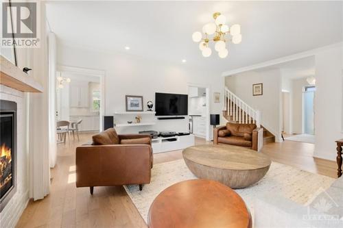 222 Pioneer Road, Russell, ON - Indoor Photo Showing Living Room With Fireplace