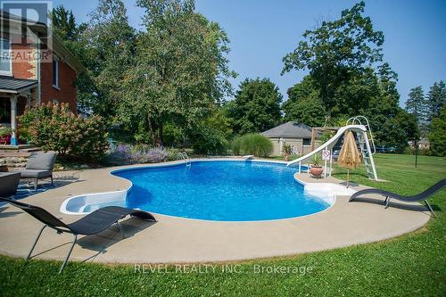 386 Maple Avenue S, Brant (Burford), ON - Outdoor With In Ground Pool With Backyard