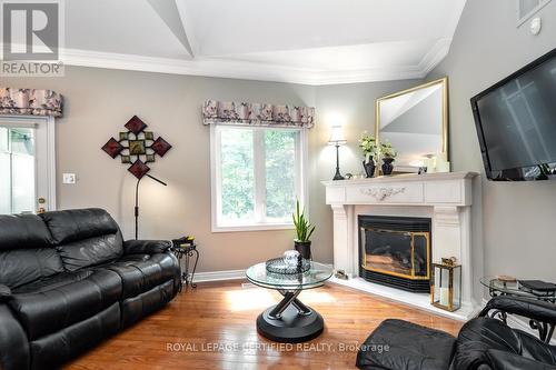 12 Nailsworth Crescent, Caledon, ON - Indoor Photo Showing Living Room With Fireplace