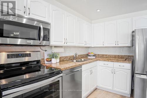 609 - 3590 Kaneff Crescent, Mississauga (Mississauga Valleys), ON - Indoor Photo Showing Kitchen With Double Sink