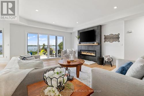 2400 County Rd 3, Prince Edward County (Ameliasburgh), ON - Indoor Photo Showing Living Room With Fireplace