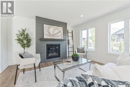 518 Newfoundland Street, Wellington North (Mount Forest), ON - Indoor Photo Showing Living Room With Fireplace