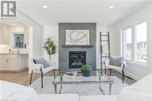 518 Newfoundland Street, Wellington North (Mount Forest), ON - Indoor Photo Showing Living Room With Fireplace