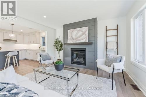 518 Newfoundland Street, Wellington North (Mount Forest), ON - Indoor Photo Showing Living Room With Fireplace