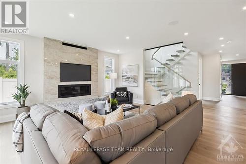 42 Parkland Crescent, Ottawa, ON - Indoor Photo Showing Living Room With Fireplace