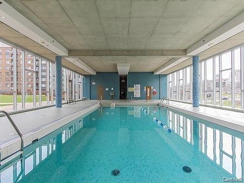 Piscine - 1203-650 Rue Jean-D'Estrées, Montréal (Ville-Marie), QC - Indoor Photo Showing Other Room With In Ground Pool