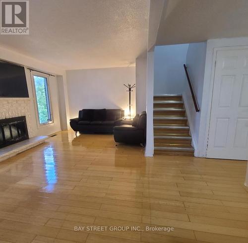 73 Treetops Court, Toronto, ON - Indoor Photo Showing Living Room With Fireplace