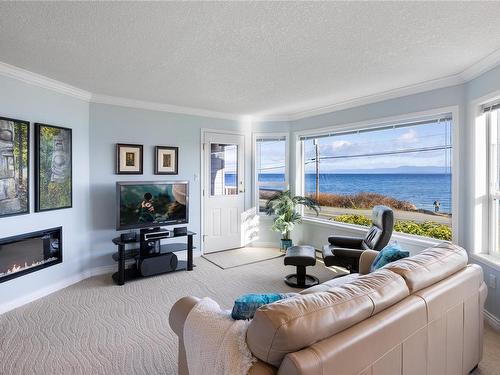 102-3132 Island Hwy West, Qualicum Beach, BC - Indoor Photo Showing Living Room With Fireplace