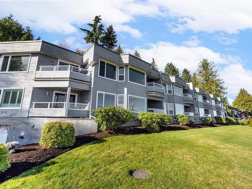 102-3132 Island Hwy West, Qualicum Beach, BC - Outdoor With Balcony With Facade