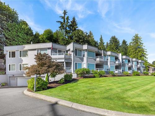 102-3132 Island Hwy West, Qualicum Beach, BC - Outdoor With Balcony With Facade