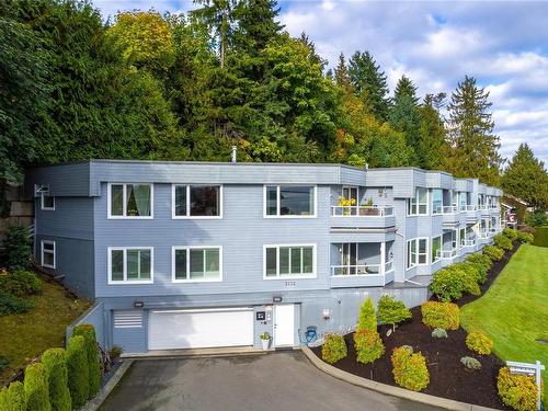 102-3132 Island Hwy West, Qualicum Beach, BC - Outdoor With Balcony With Facade