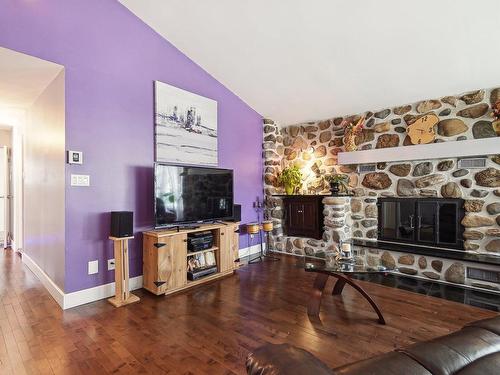 Living room - 1458 Rue Labelle, Mascouche, QC - Indoor Photo Showing Living Room With Fireplace