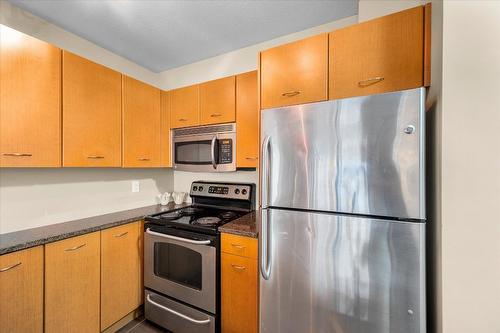 201-533 Yates Road, Kelowna, BC - Indoor Photo Showing Kitchen With Stainless Steel Kitchen