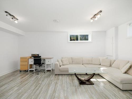 Salle familiale - 570 Rue Populaire, Terrebonne (Lachenaie), QC - Indoor Photo Showing Living Room