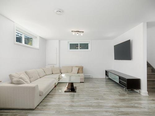 Salle familiale - 570 Rue Populaire, Terrebonne (Lachenaie), QC - Indoor Photo Showing Living Room