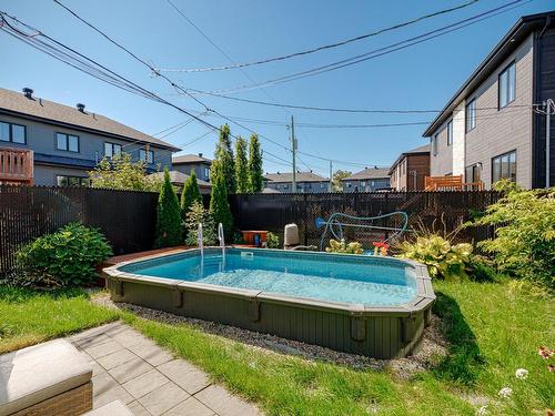 Cour - 570 Rue Populaire, Terrebonne (Lachenaie), QC - Outdoor With Above Ground Pool With Backyard