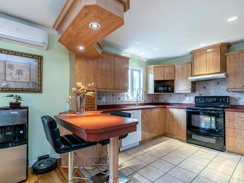 Cuisine - 6755 Rue Booker, Brossard, QC - Indoor Photo Showing Kitchen With Double Sink