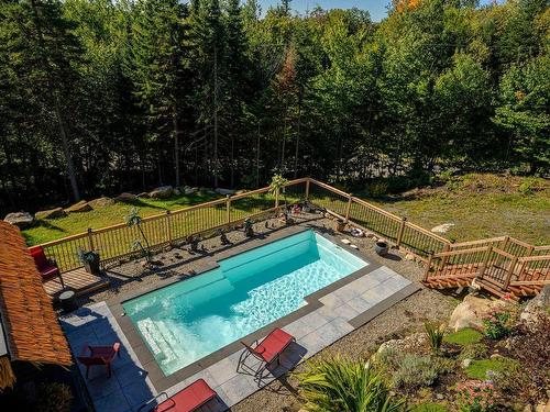 Backyard - 11 Ch. Des Fougères, Saint-Sauveur, QC - Outdoor With In Ground Pool