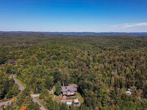 Aerial photo - 11 Ch. Des Fougères, Saint-Sauveur, QC - Outdoor With View