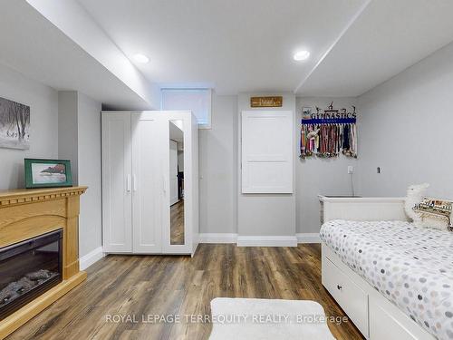 2187 Austin Crt, Burlington, ON - Indoor Photo Showing Bedroom With Fireplace