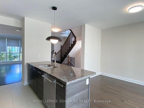 1-5040 Four Springs Ave, Mississauga, ON - Indoor Photo Showing Kitchen With Double Sink