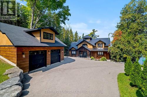 1738 Poplar Point Road, Smith-Ennismore-Lakefield, ON - Outdoor With Facade