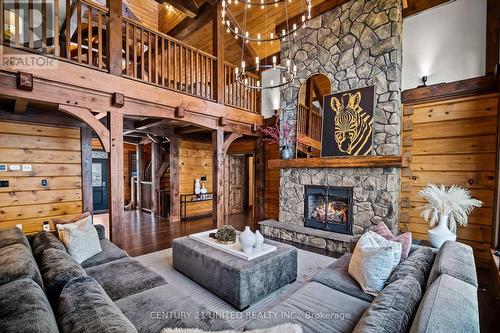 1738 Poplar Point Road, Smith-Ennismore-Lakefield, ON - Indoor Photo Showing Living Room With Fireplace