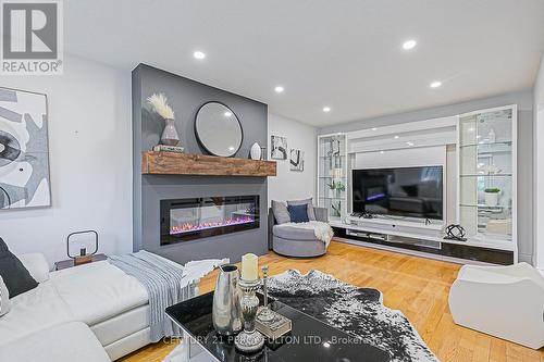 67 Cheeseman Drive, Markham, ON - Indoor Photo Showing Living Room With Fireplace