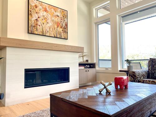 8761 Riverside Drive, Grand Forks, BC - Indoor Photo Showing Living Room With Fireplace