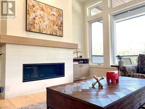 8761 Riverside Drive, Grand Forks, BC - Indoor Photo Showing Living Room With Fireplace