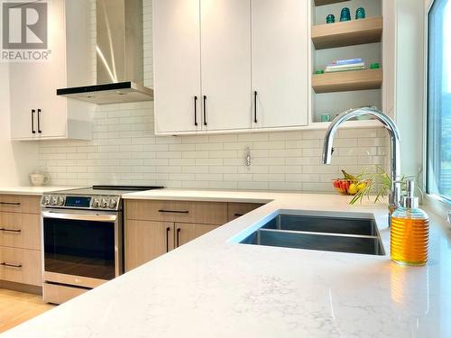 8761 Riverside Drive, Grand Forks, BC - Indoor Photo Showing Kitchen With Double Sink With Upgraded Kitchen