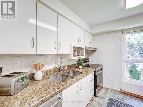 181 Rusty Crestway, Toronto, ON - Indoor Photo Showing Kitchen With Double Sink