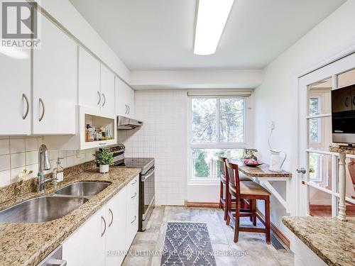 181 Rusty Crestway, Toronto, ON - Indoor Photo Showing Kitchen With Double Sink