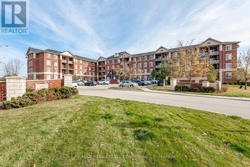 113 - 1440 Gordon Street, Guelph (Pine Ridge), ON - Outdoor With Balcony With Facade