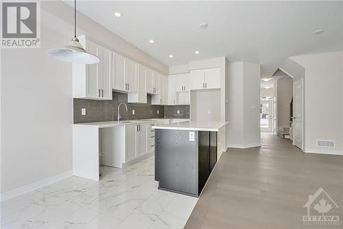 This home has not been built yet. Images provided are to showcase builder finishes. - 1940 Hawker Private, Ottawa, ON - Indoor Photo Showing Kitchen With Upgraded Kitchen