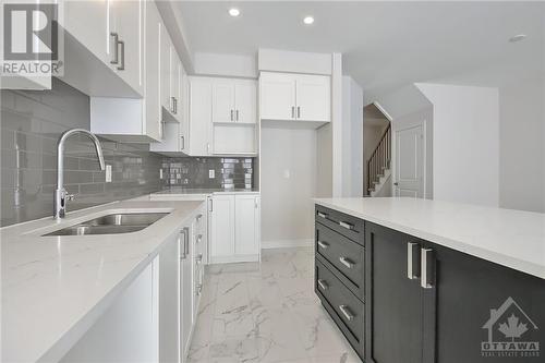 This home has not been built. Images provided are to showcase builder finishes. - 1928 Hawker Private, Ottawa, ON - Indoor Photo Showing Kitchen With Double Sink