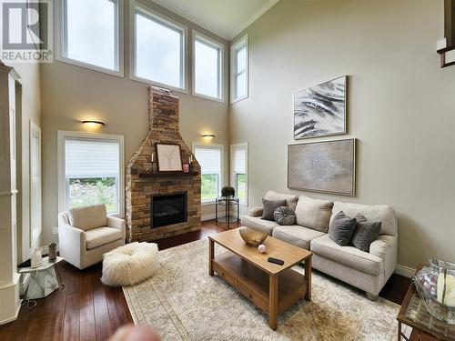 193 Three Island Pond Road, Paradise, NL - Indoor Photo Showing Living Room With Fireplace