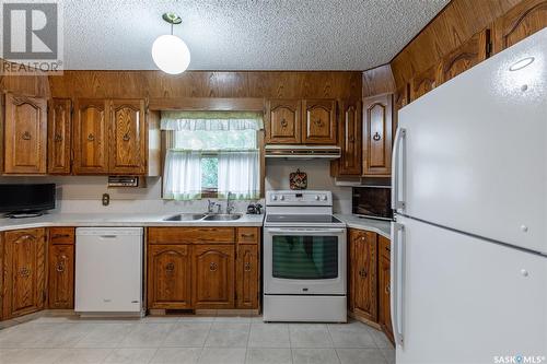 1 Calypso Drive, Moose Jaw, SK - Indoor Photo Showing Kitchen With Double Sink